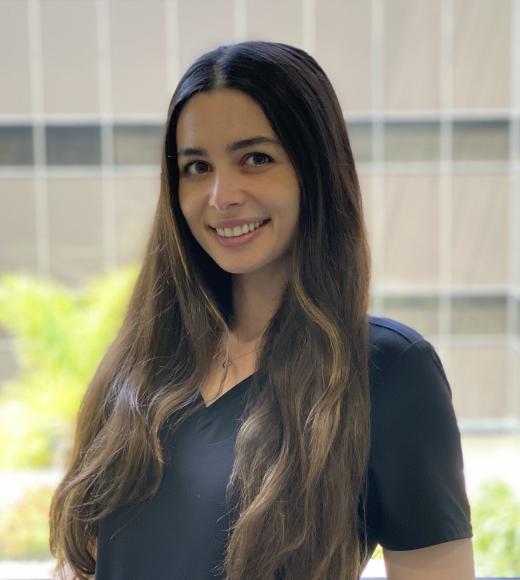 A woman smiling
