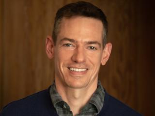 Headshot of John Pachankis smiling