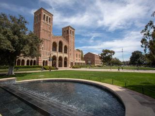 Shapiro fountain, a large circular pool of water, in front of UCLA's Royce Hall